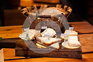 Cheese plate of Asturian cheese: Cabrales, AfuegaÃ¢â¬â¢l Pitu, Vidiago, Queso de Oveja sheep milk cheese and Ahumados smoked cheese photo
